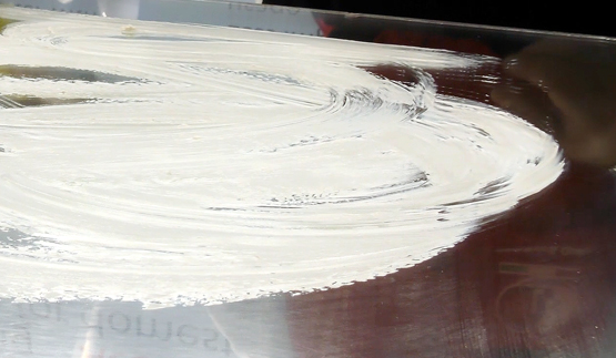 Mister Dry detergent for glass on mirrored glass